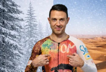 Morgan Bello wearing YMCA-themed biking attire. His photo is edited onto a background that is split between a Canadian Winter and a Moroccan desert.
