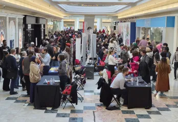 Place d'Orleans Shopping Centre atrium filled with employers booths and job seekers