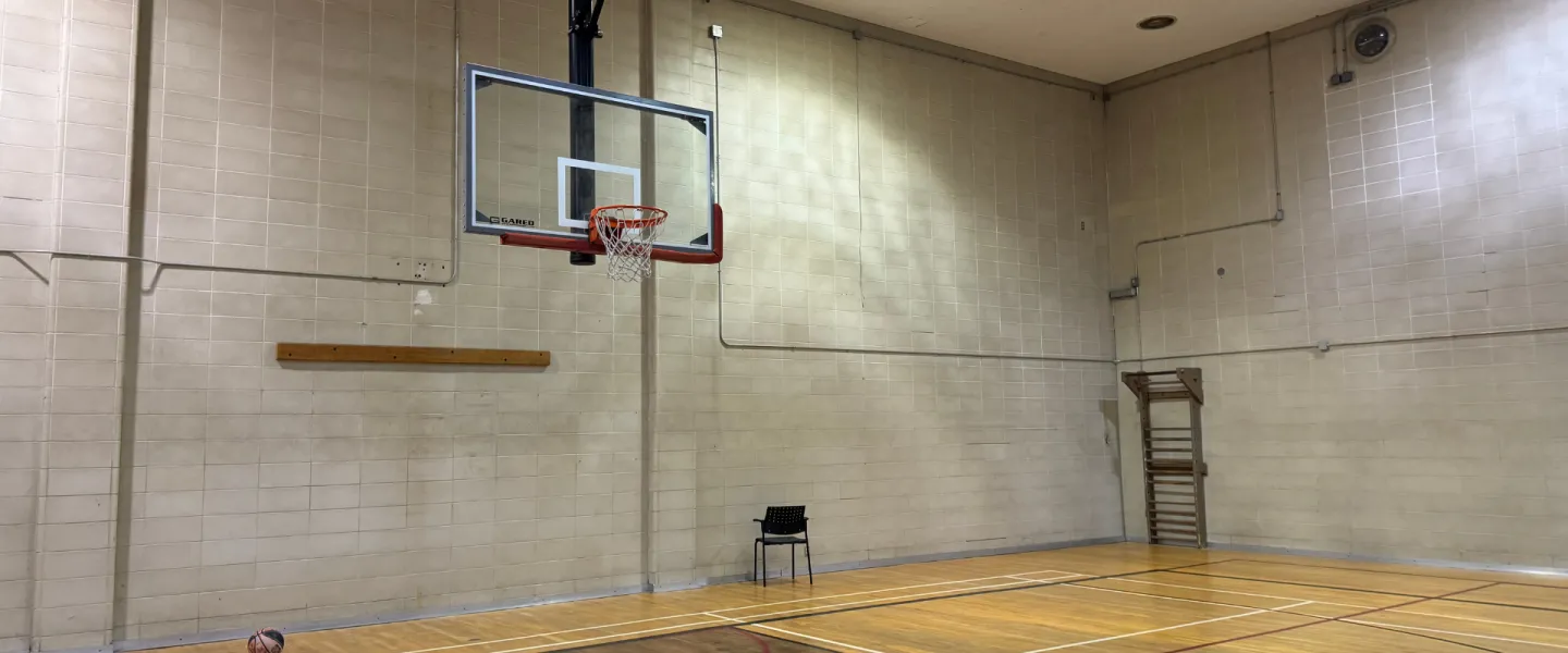 Taggart Family Y gymnasium with basketball hoop
