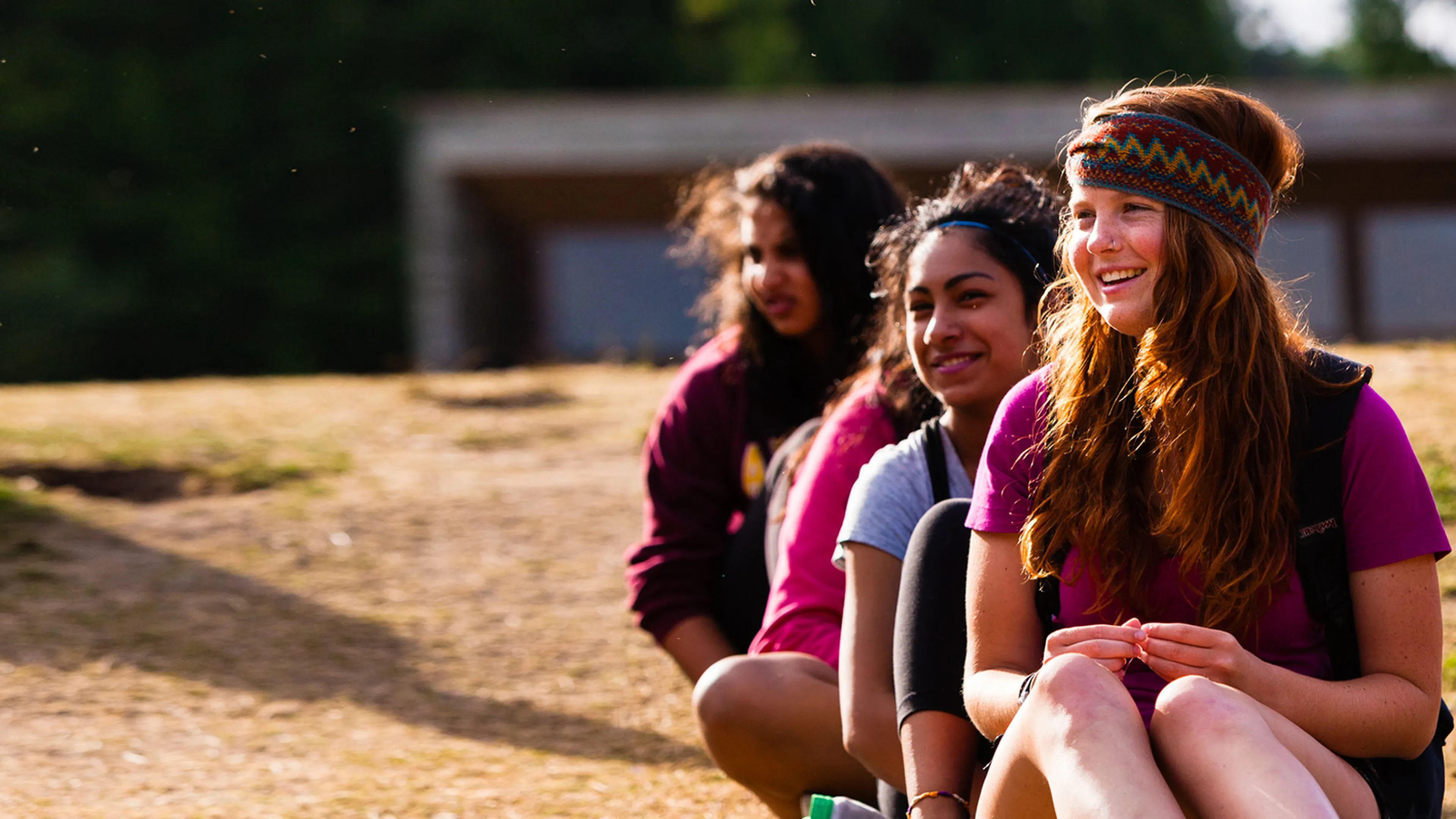 A group of teenage girls sitting together.
