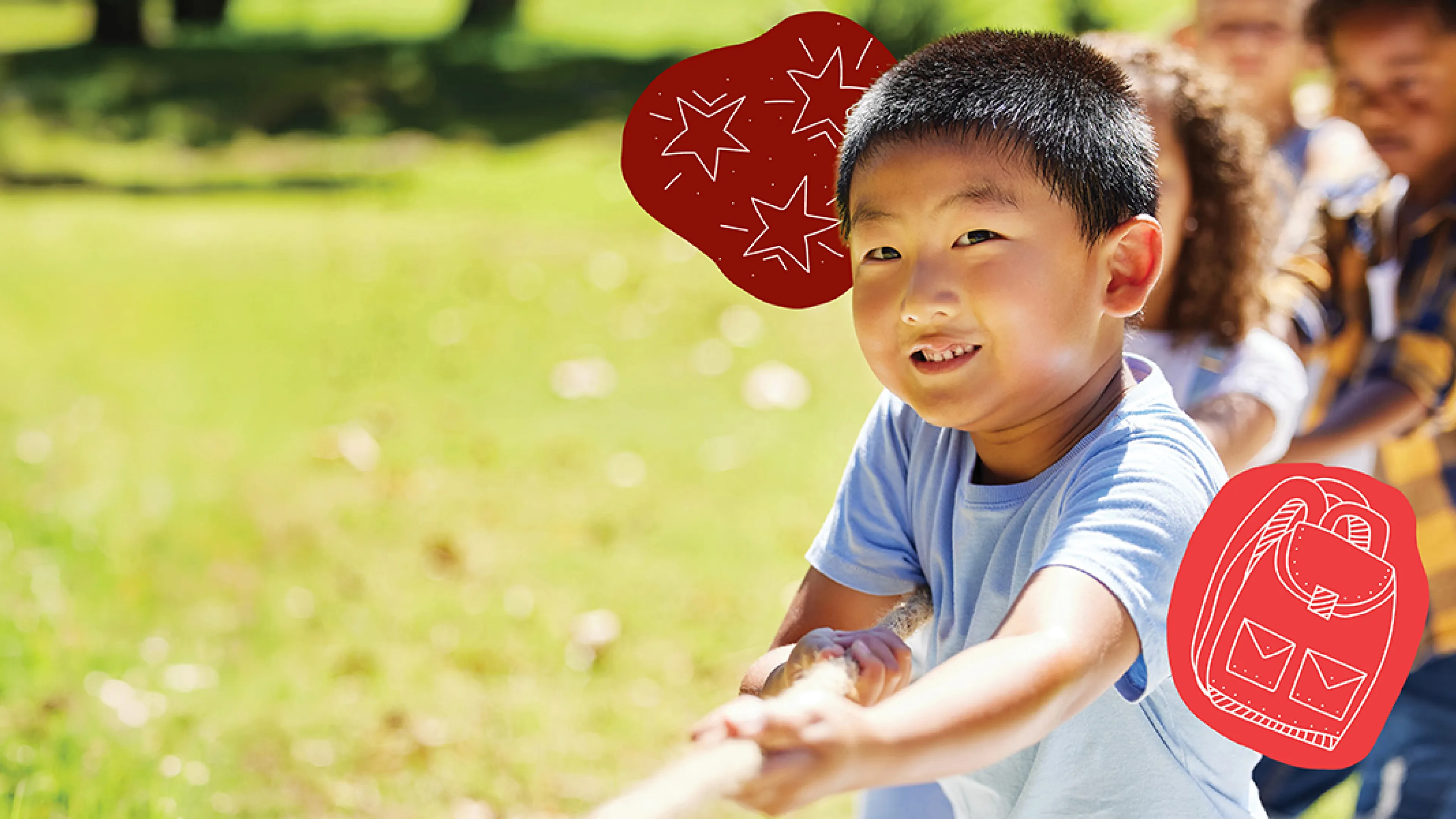 A cheerful boy stands in a vibrant field, smiling brightly as he enjoys the sunny day.