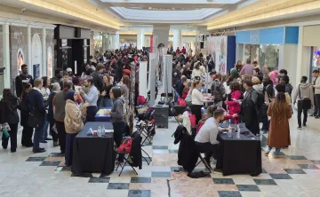 Place d'Orleans Shopping Centre atrium filled with employers booths and job seekers